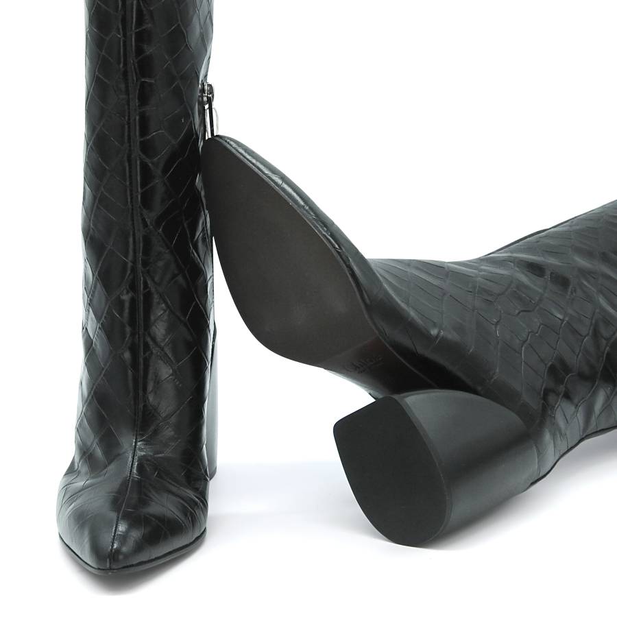Black crocodile embossed leather boots
