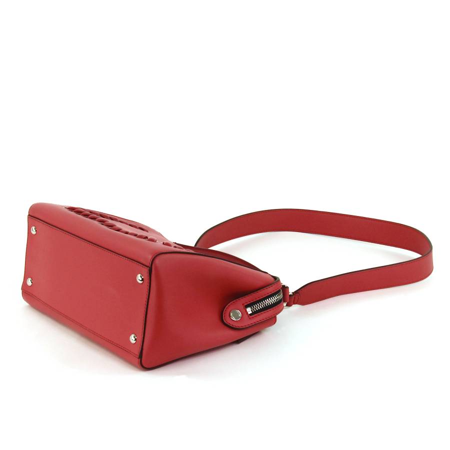 Red leather bag with silver jewellery