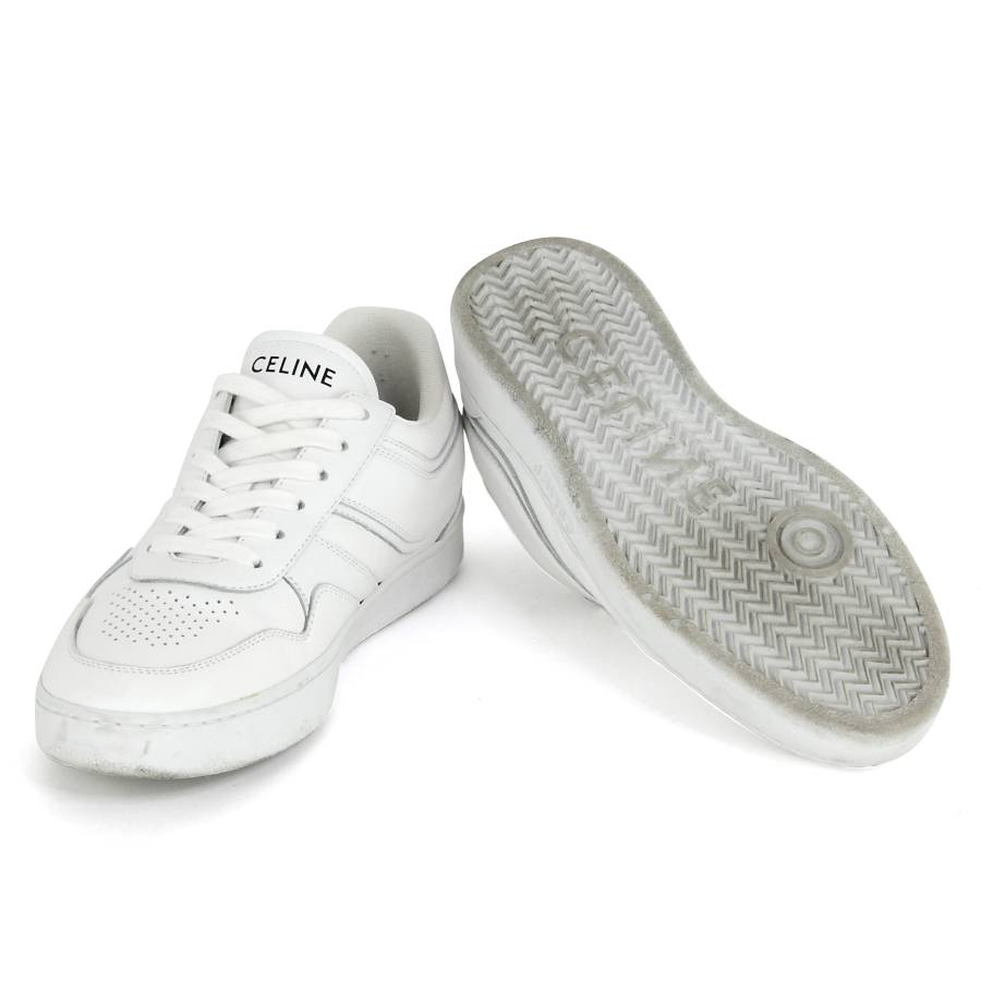 White trainers with logo