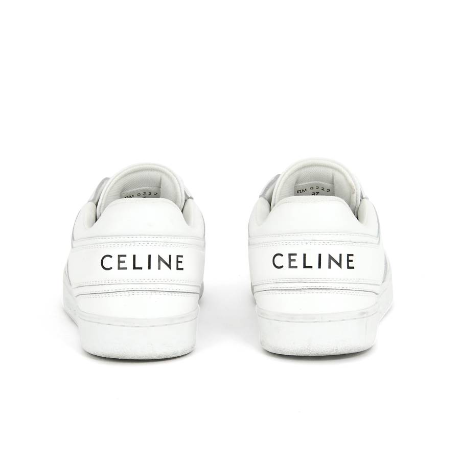 White trainers with logo
