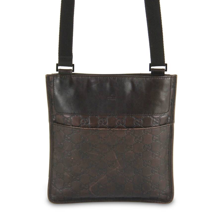Brown leather bag with shoulder strap
