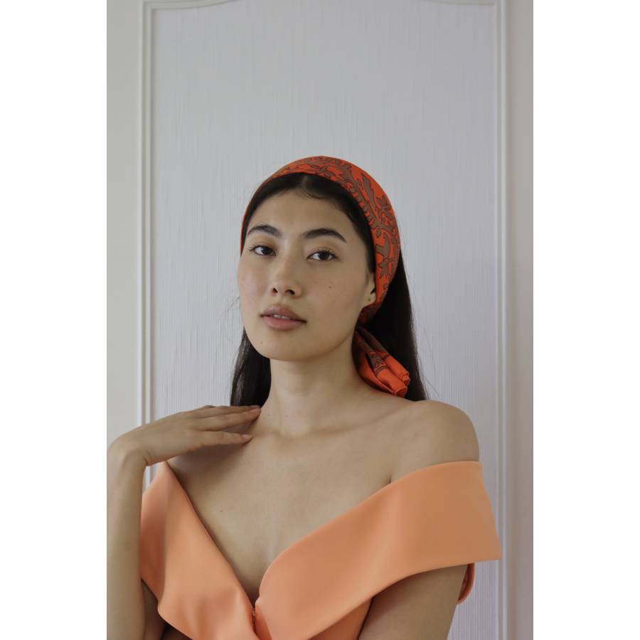 Orange silk scarf with animal motifs