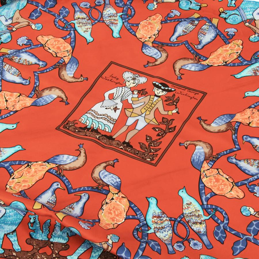 Orange silk scarf with animal motifs