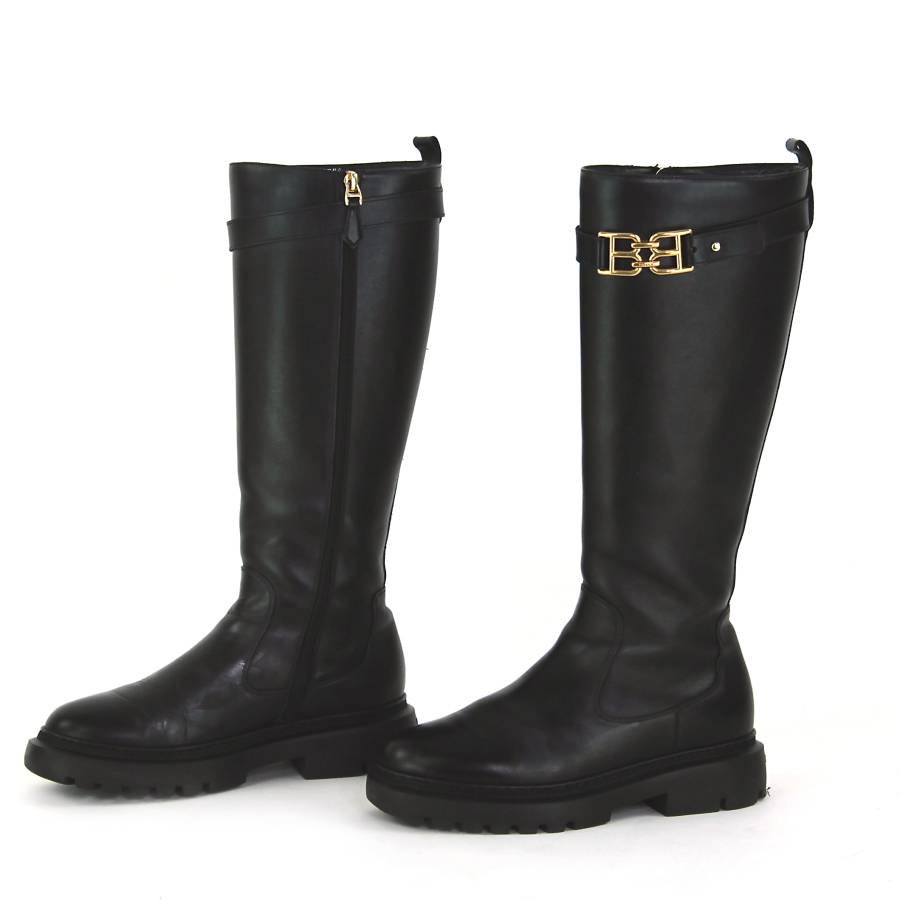 High boots in black leather with gold buckles