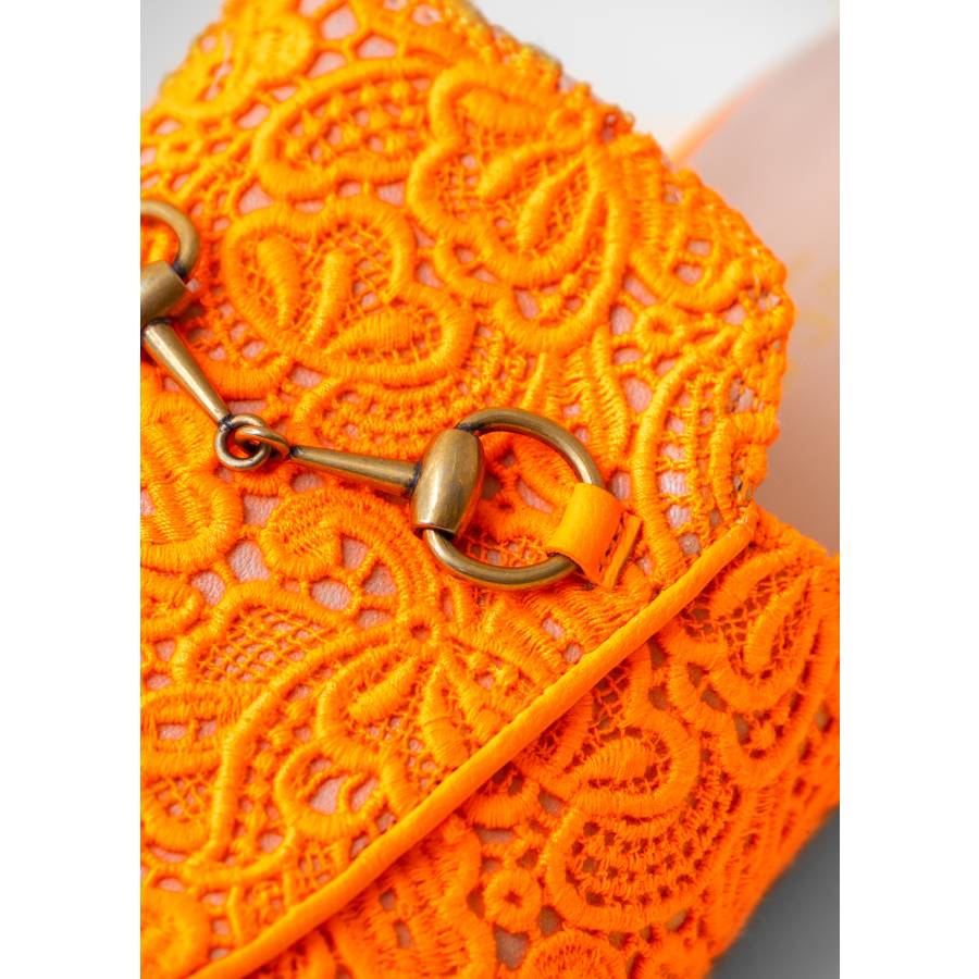 Leather mules with orange embroidery