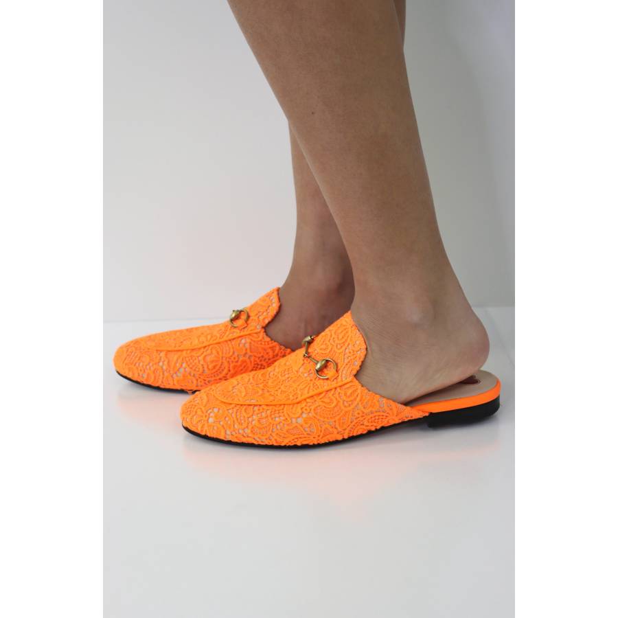 Leather mules with orange embroidery