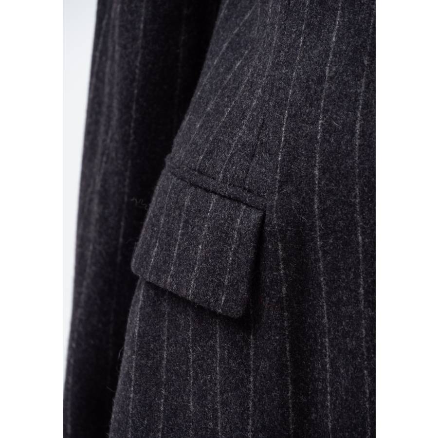 Striped suit in gray wool and black buttons