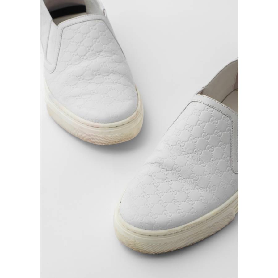 White leather slip-on sneakers