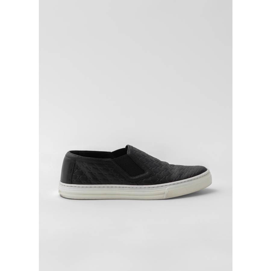 Black leather slip-on sneakers