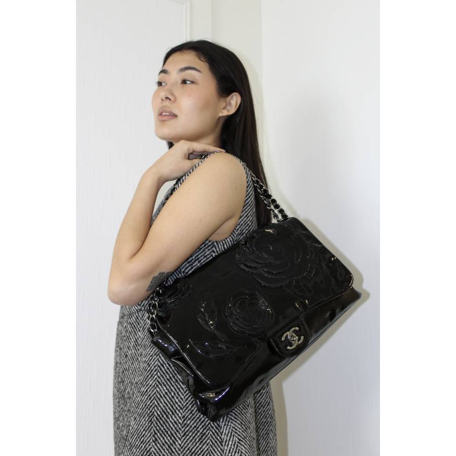 Chanel Maxi Jumbo Classic Flap bag in black patent leather