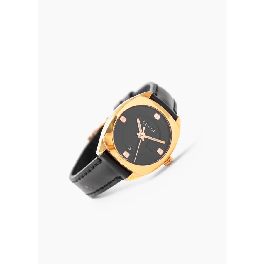 Watch in gold and black steel