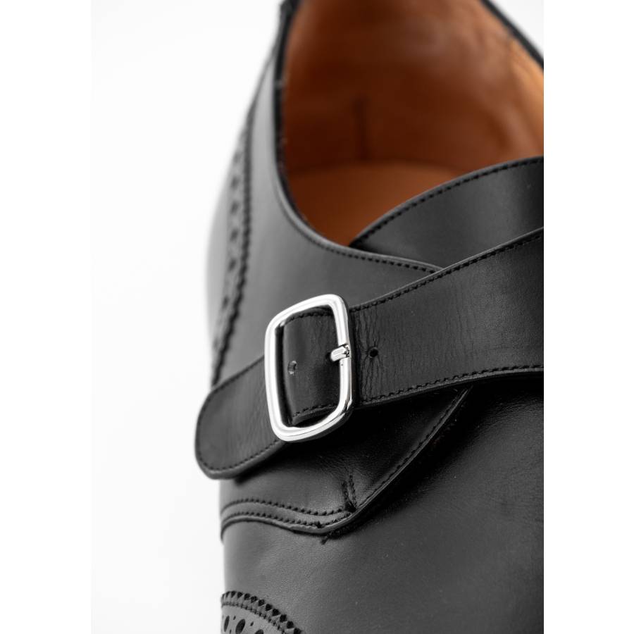 Black leather loafers with buckle