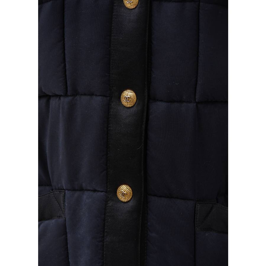 Black down jacket with gold buttons