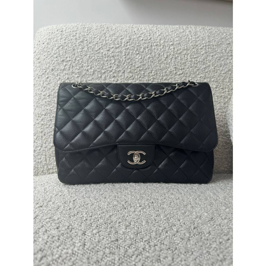 Chanel timeless jumbo double flap in black caviar leather