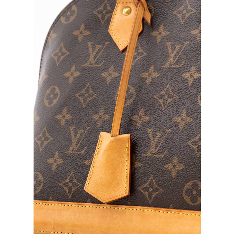 Alma PM brown bag in leather and monogram canvas