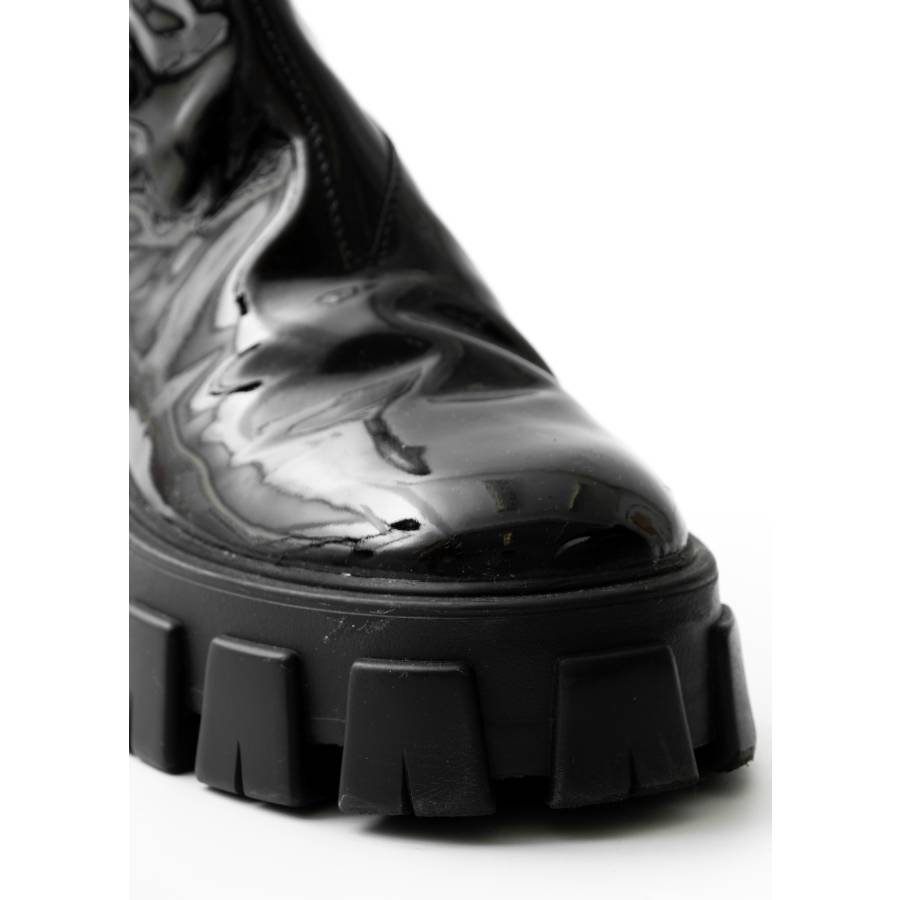 Monolith black patent leather boots