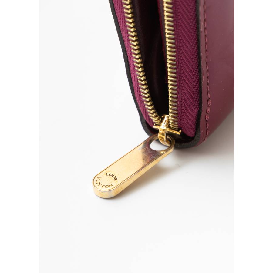 Portefeuille Zippy en cuir verni fuschia