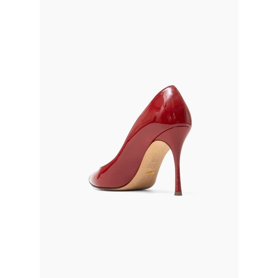 Red patent leather pumps