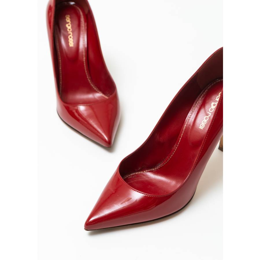 Red patent leather pumps