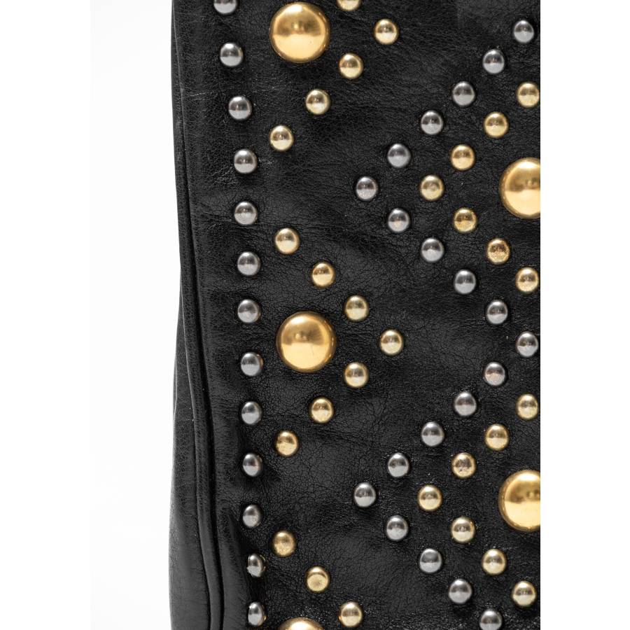 Black clutch with studs