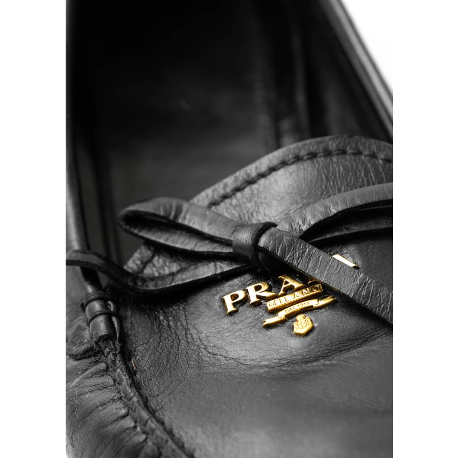 Black leather loafers