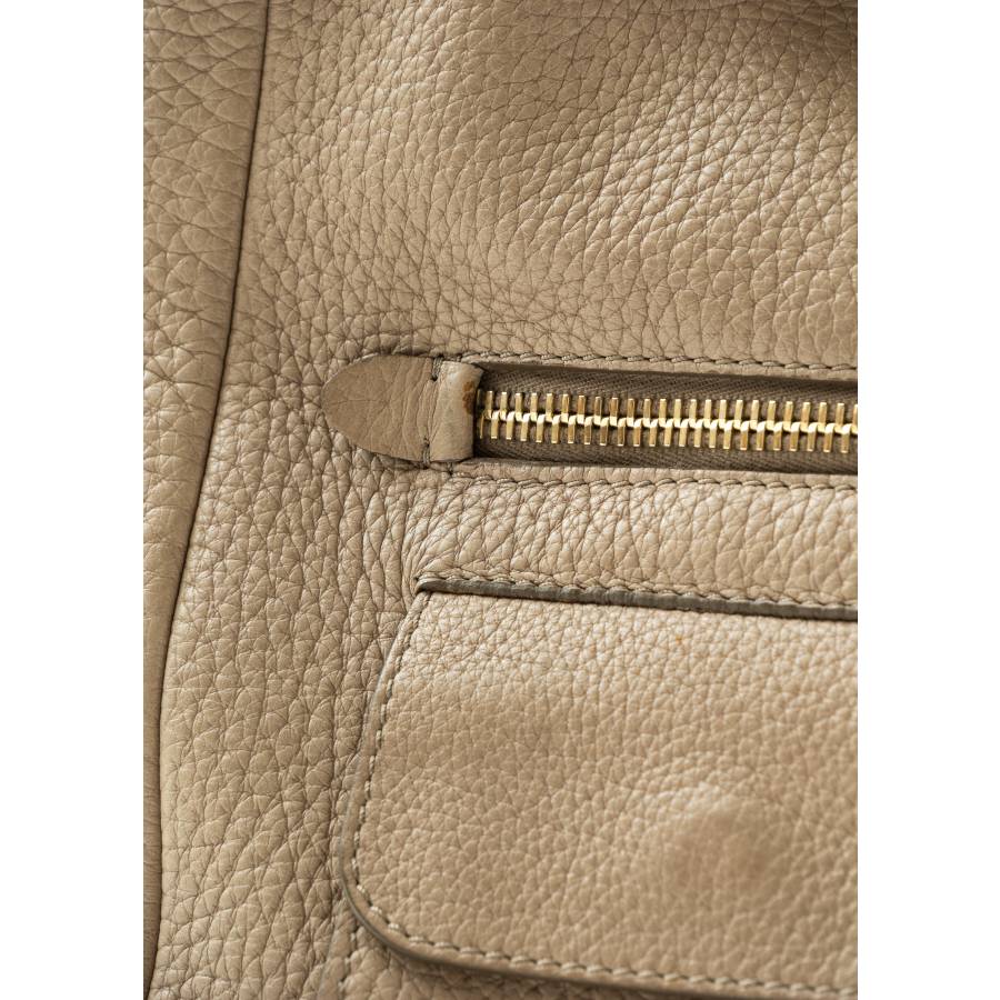 Large beige leather handbag