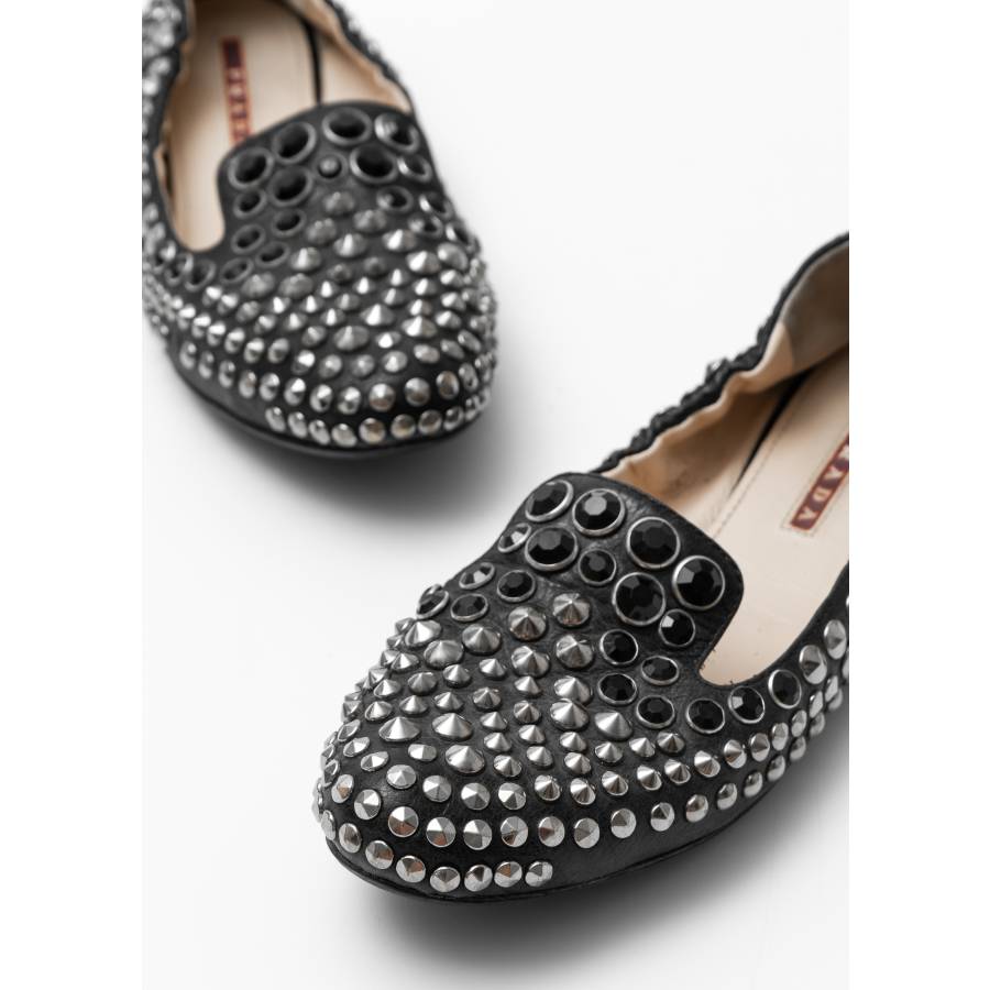 Black studded loafers