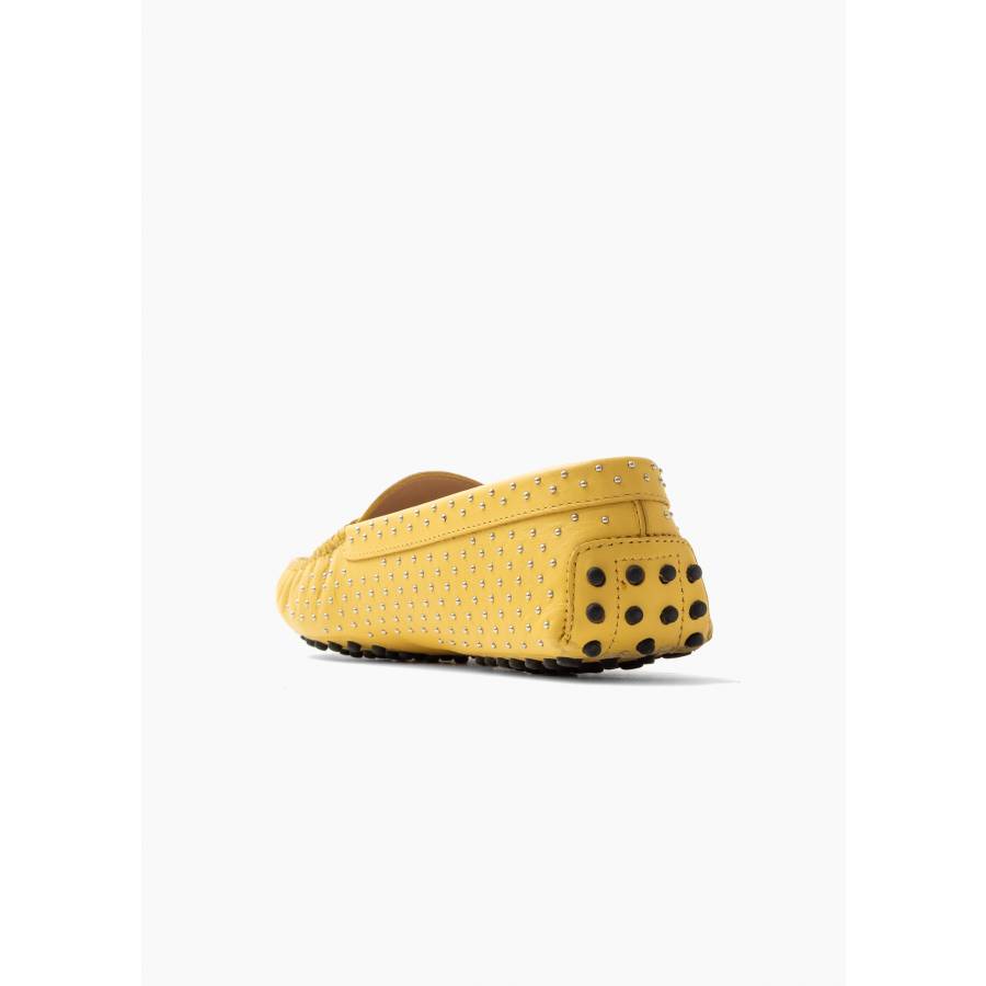 Yellow moccasins with studs