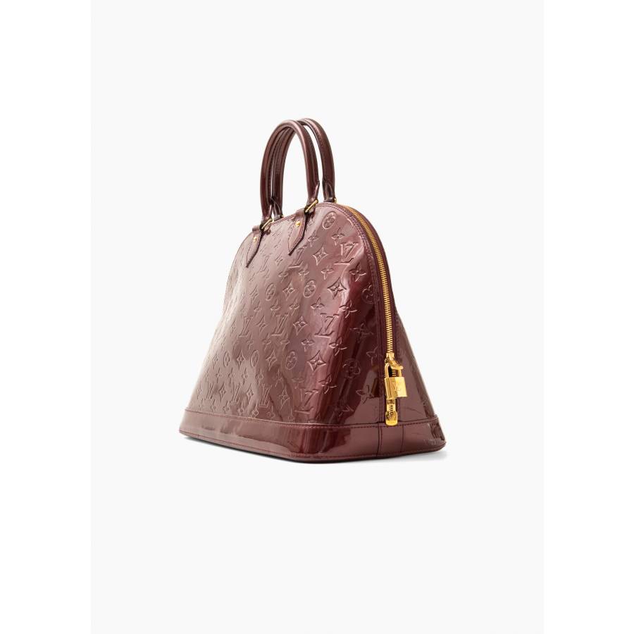 Alma bag in burgundy patent leather