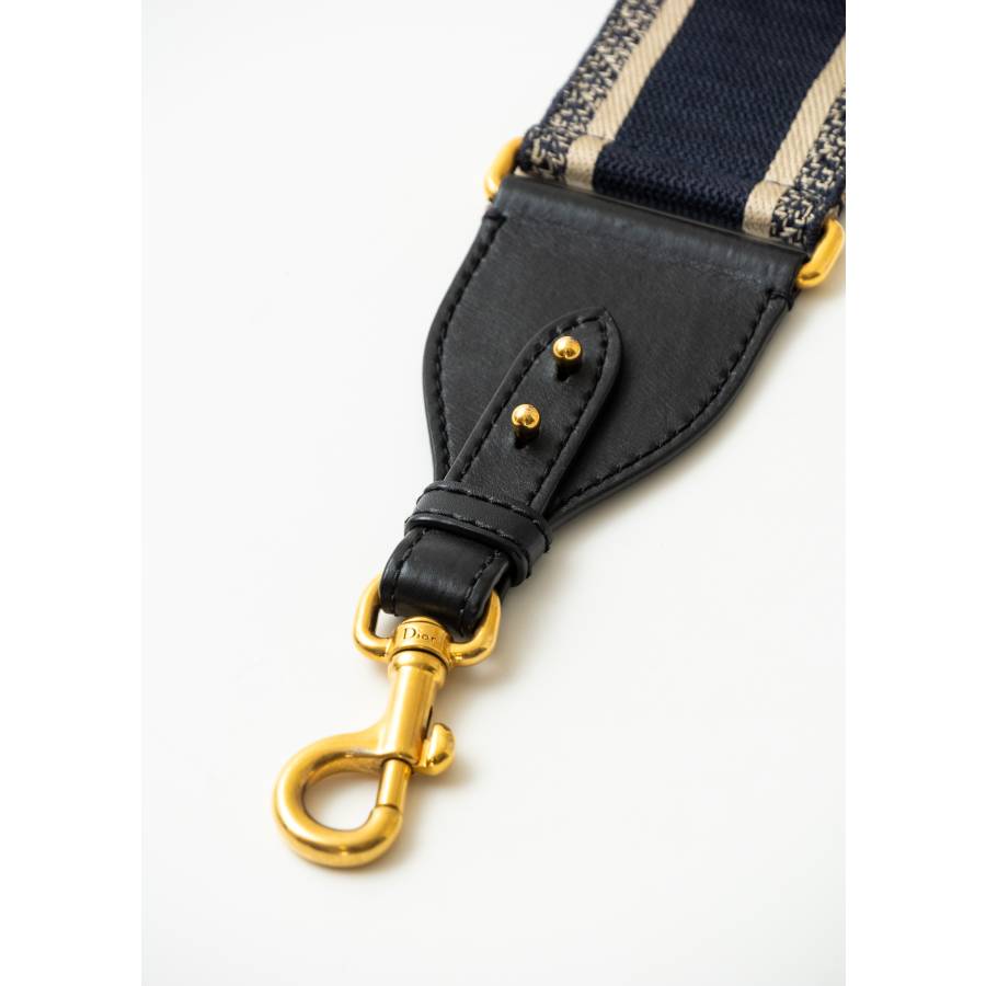 Navy blue and beige shoulder strap