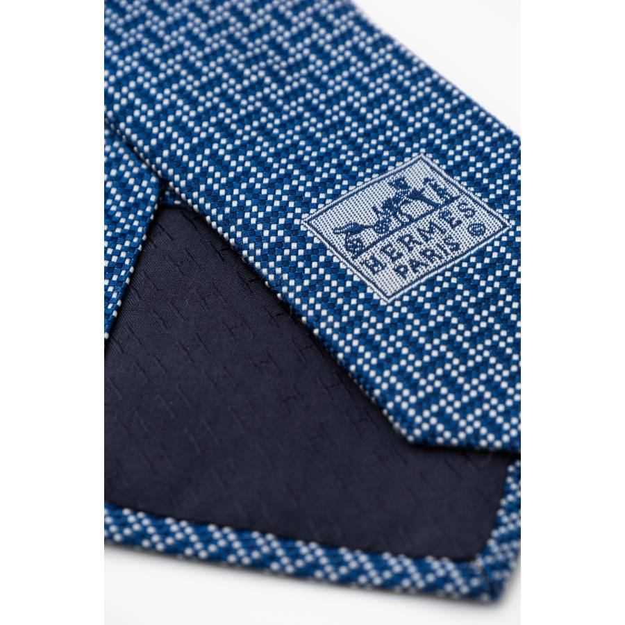 Cravate bleu marine et blanche motif rectangle