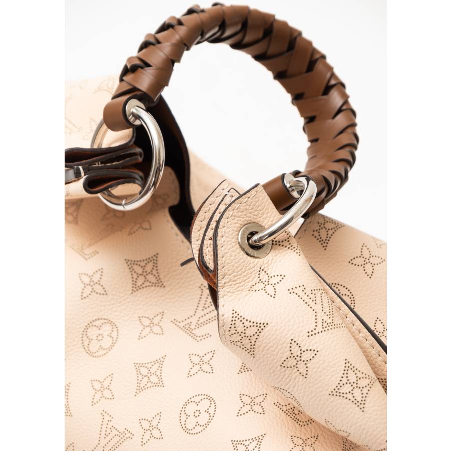 Monogram perforated leather hobo bag