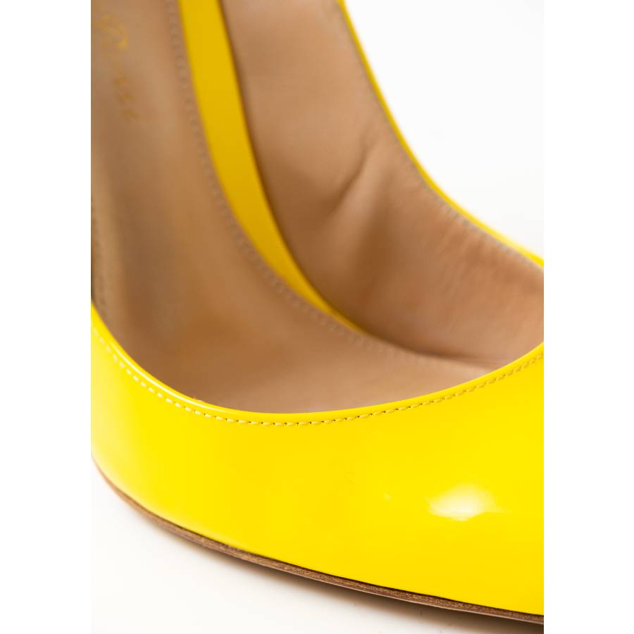 Yellow patent leather pumps