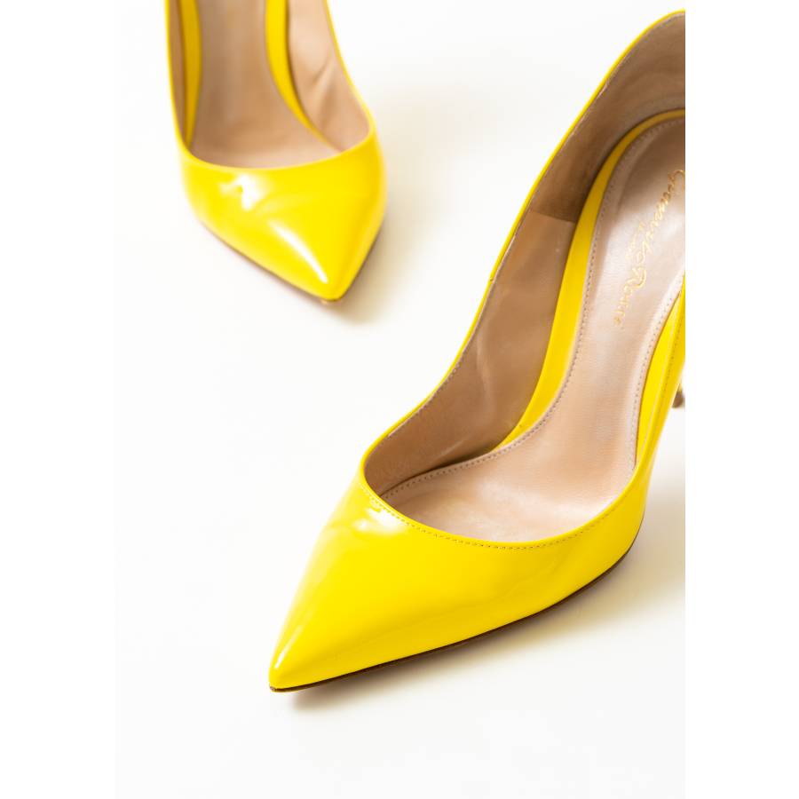 Yellow patent leather pumps