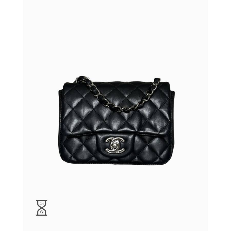 Timeless Mini Flap aus schwarzem Leder