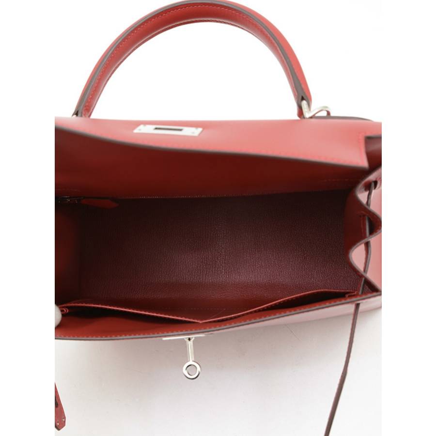 Kelly 28 en cuir Tadelakt rouge