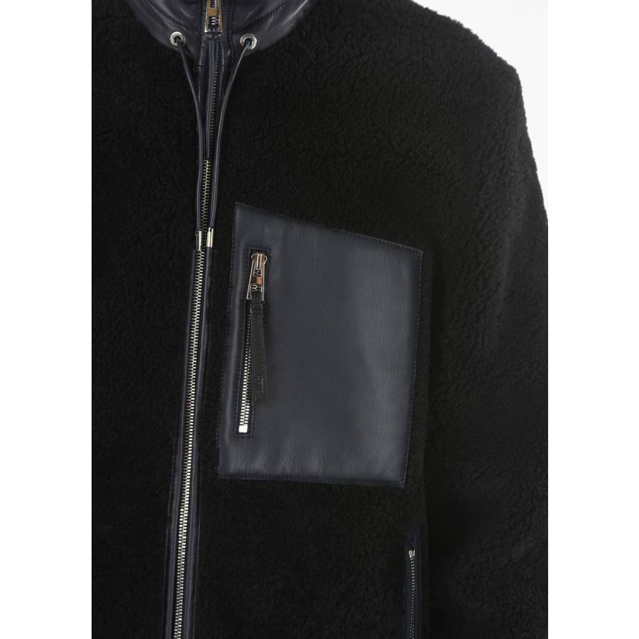 Veste en cuir et peau de mouton retourné