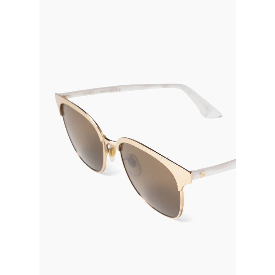 Sonnenbrille aus vergoldetem Metall