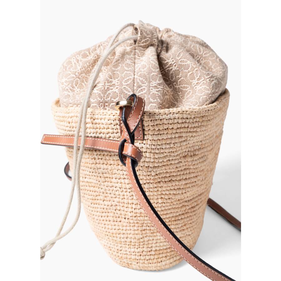 Natural raffia and leather bucket bag