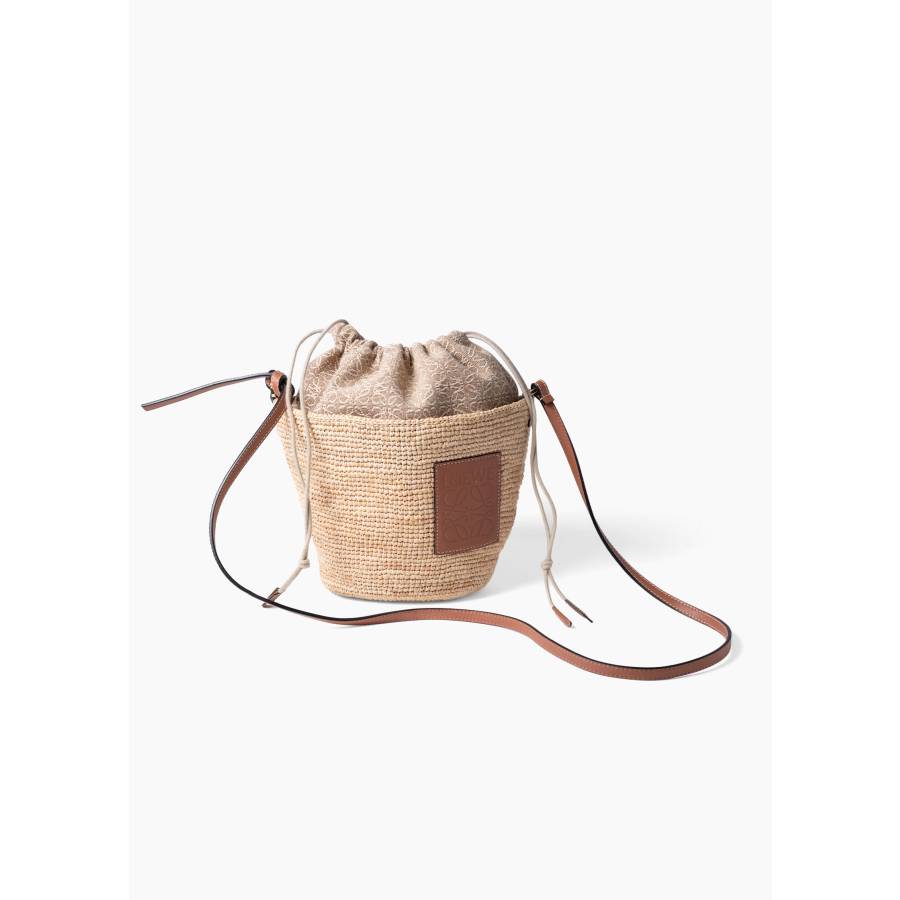 Natural raffia and leather bucket bag